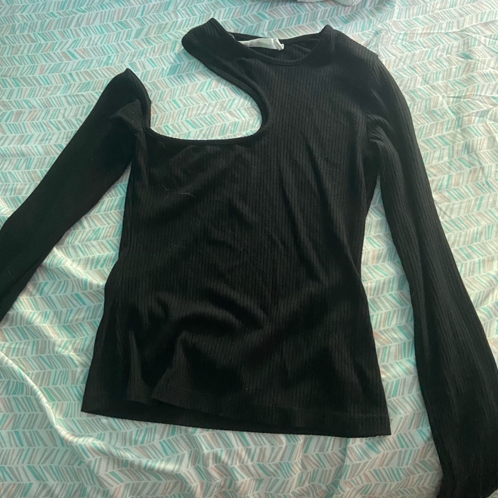 long sleeve black shirt with open shoulder on one side